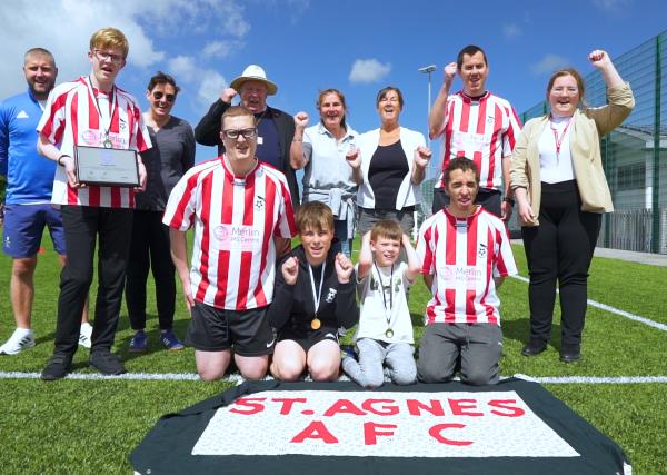 St Agnes AFC players standing on a football pitch 